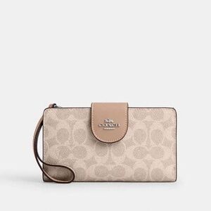 Coach Phone Wallet In Signature Canvas